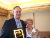 Peter Riffle with Patricia Lillie, president of the LDA of America